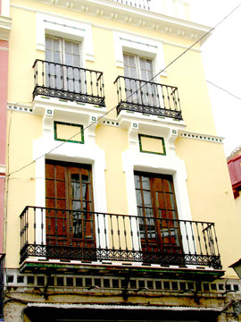 Balconera de madera con cristal climalit